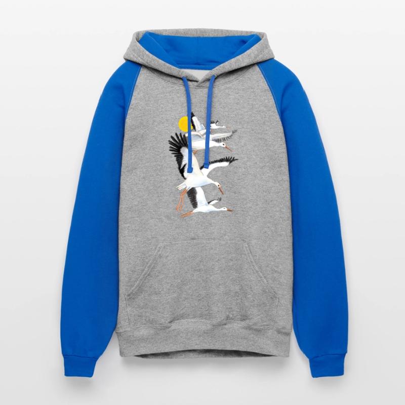 A Flock of White Storks Flying over the Sun